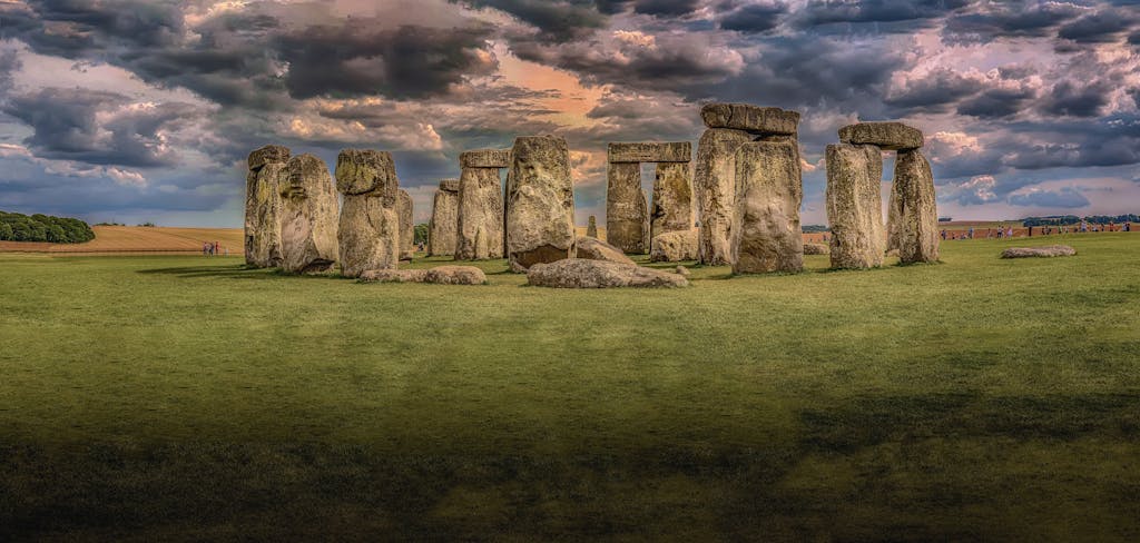 Panoramic view of Stonehenge with dramatic clouds in Wiltshire, England. Iconic prehistoric monument.